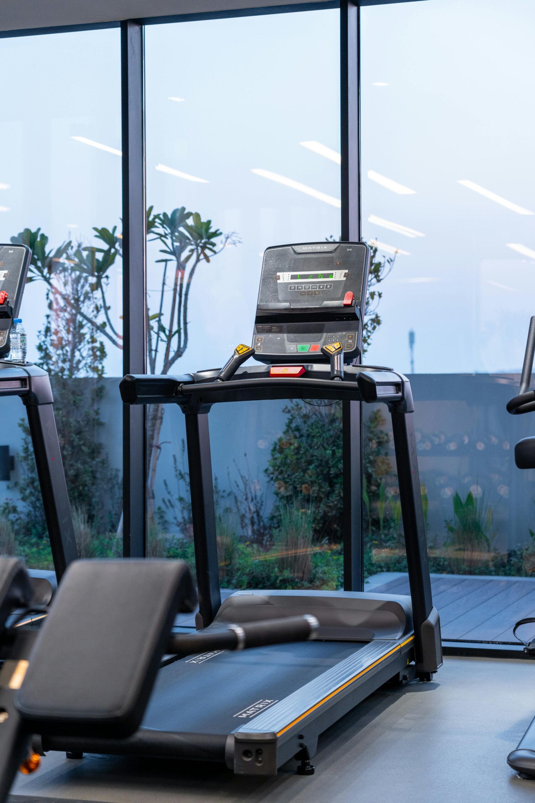 Male running on treadmill in al ain gym