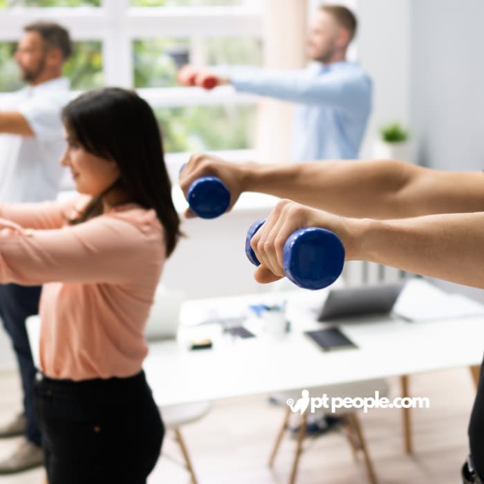 Employees in Dubai using on-site fitness facilities offered through their corporate wellness program. (This describes the benefit of on-site facilities, uses the location "Dubai" and the keyword "corporate fitness programs", and highlights a specific program offering).