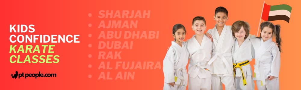 Diverse group of students in Dubai celebrate their achievements during a karate belt promotion ceremony, promoting inclusivity and growth.